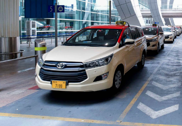 Wheelchair-accessible taxi at airport terminal